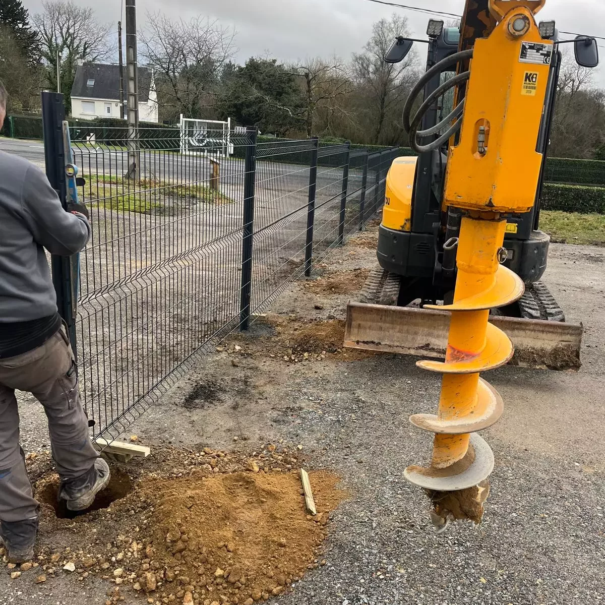 perçage pour pose poteau de cloture